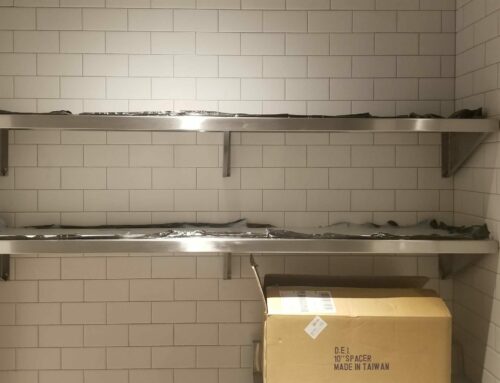 Custom fabricated stainless-steel kitchen shelves for Giordano’s pizza in downtown Denver.